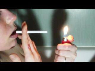 SMOKING GIRL IN SLOW MOTION. LIPS