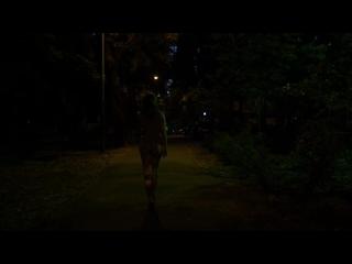 Mystery naked woman on the street at night