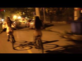 Riding our bike naked through the streets of the city - Dollscult