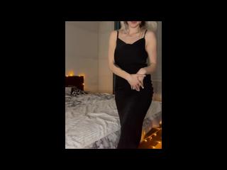 Beauty in black dress has a strong orgasm